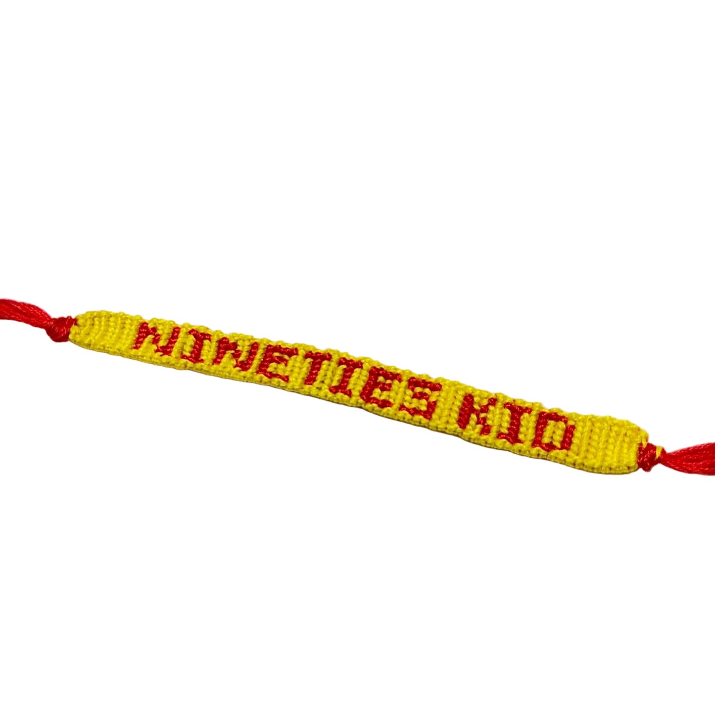 Yellow bracelet with 'Nineties Kid' text on a white background