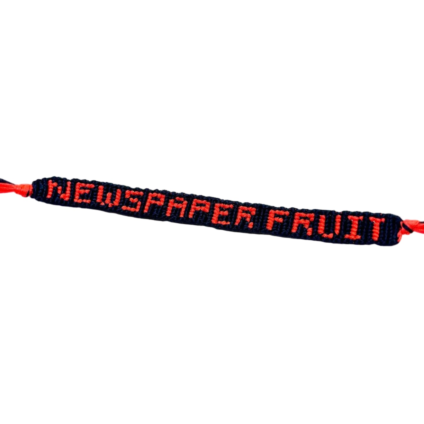 Bracelet with 'NEWSPAPER FRUIT' text on a white background