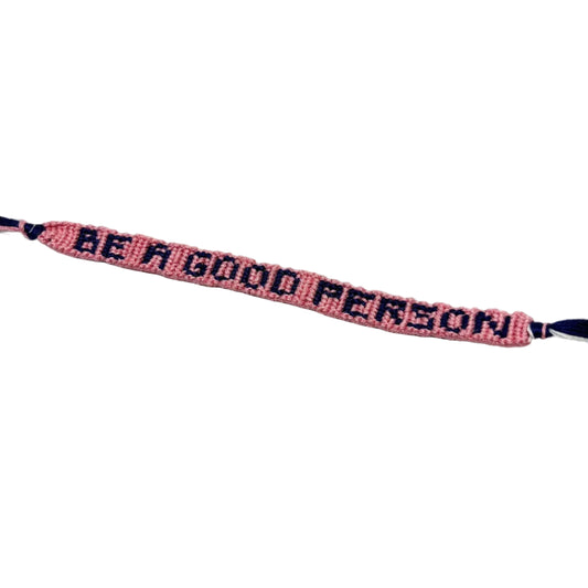 Bracelet with 'Be a Good Person' message on a white background
