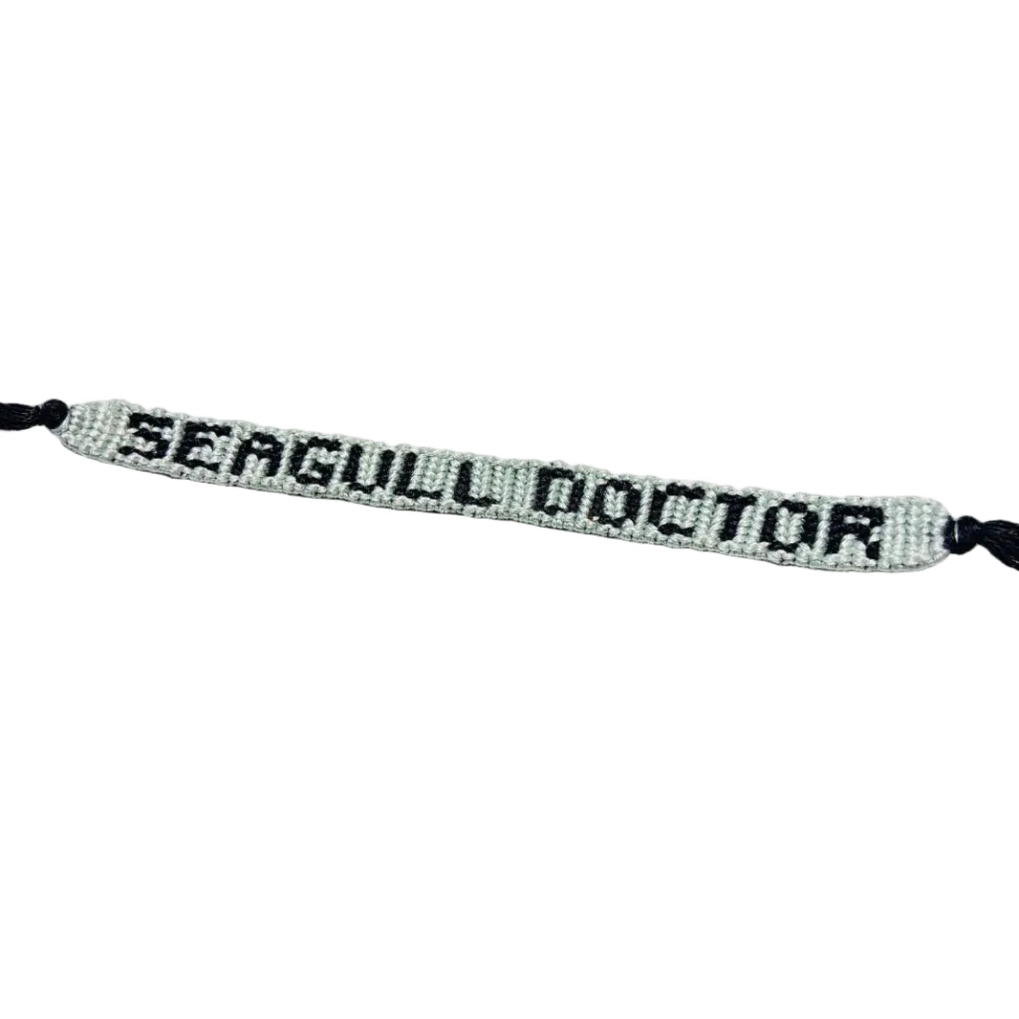 Bracelet with 'SEAGULL DOCTOR' text on a white background